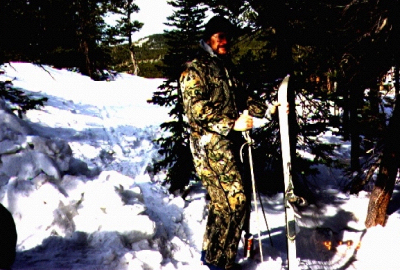 Mike in camo on a cross country ski trip